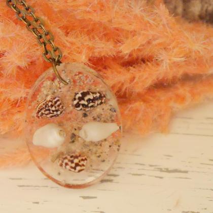 Kette Muscheln und Sand 1