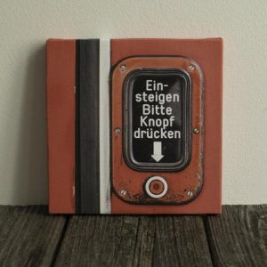 Foto auf Leinwand: „Bitte drücken“