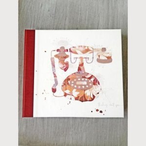 Notizblock im Umschlag „Telefon rot“