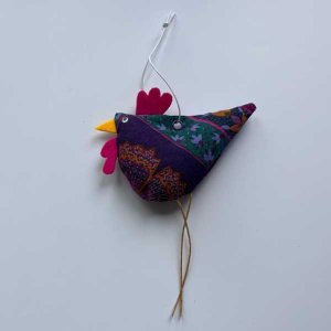 Osterdeko Henderl aus Stoff – lila gemustert