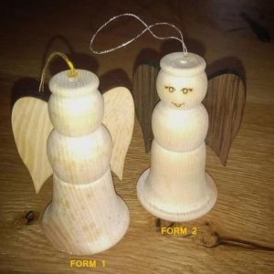 Zirbenengerl mit Gesicht