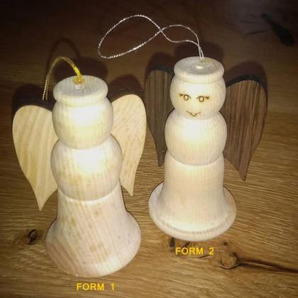 Zirbenengerl mit Gesicht