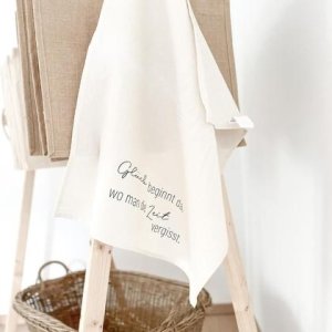 Geschirrtuch „Glück beginnt …“