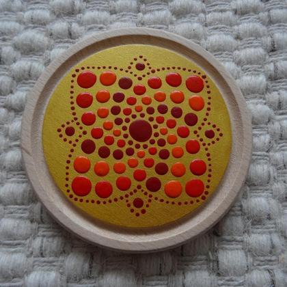 Energie-Untersetzer Rot-Gold