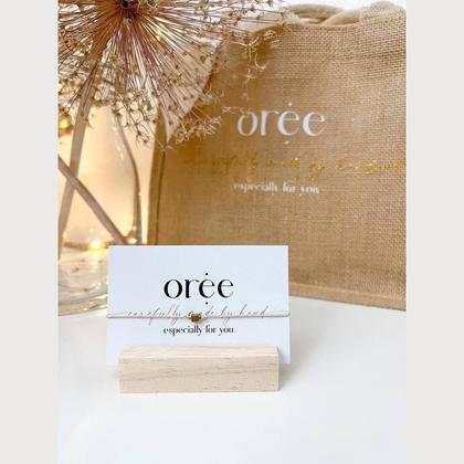 Beiges Armband mit kleinem Würfel - Image 3