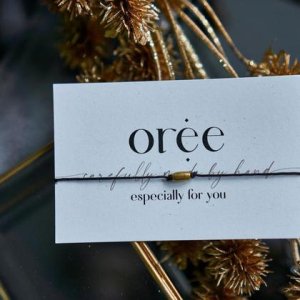 Schwarzes Armband mit ovaler Makrameeperle