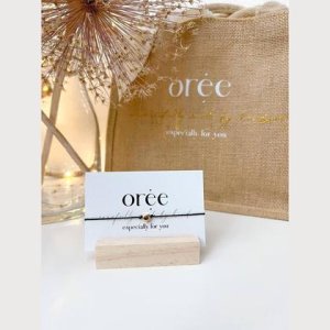 Schwarzes Armband mit roségoldenem Herz