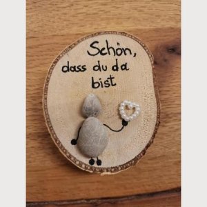 Holzscheibe mit Steinbild