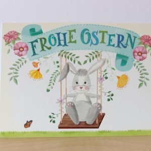 Osterkarte Osterhase auf der Schaukel
