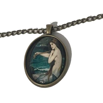 Kette - Nixe - Haare kämmend