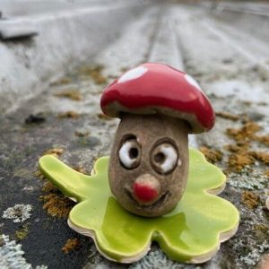 Glücksbringer Pilz auf Klee