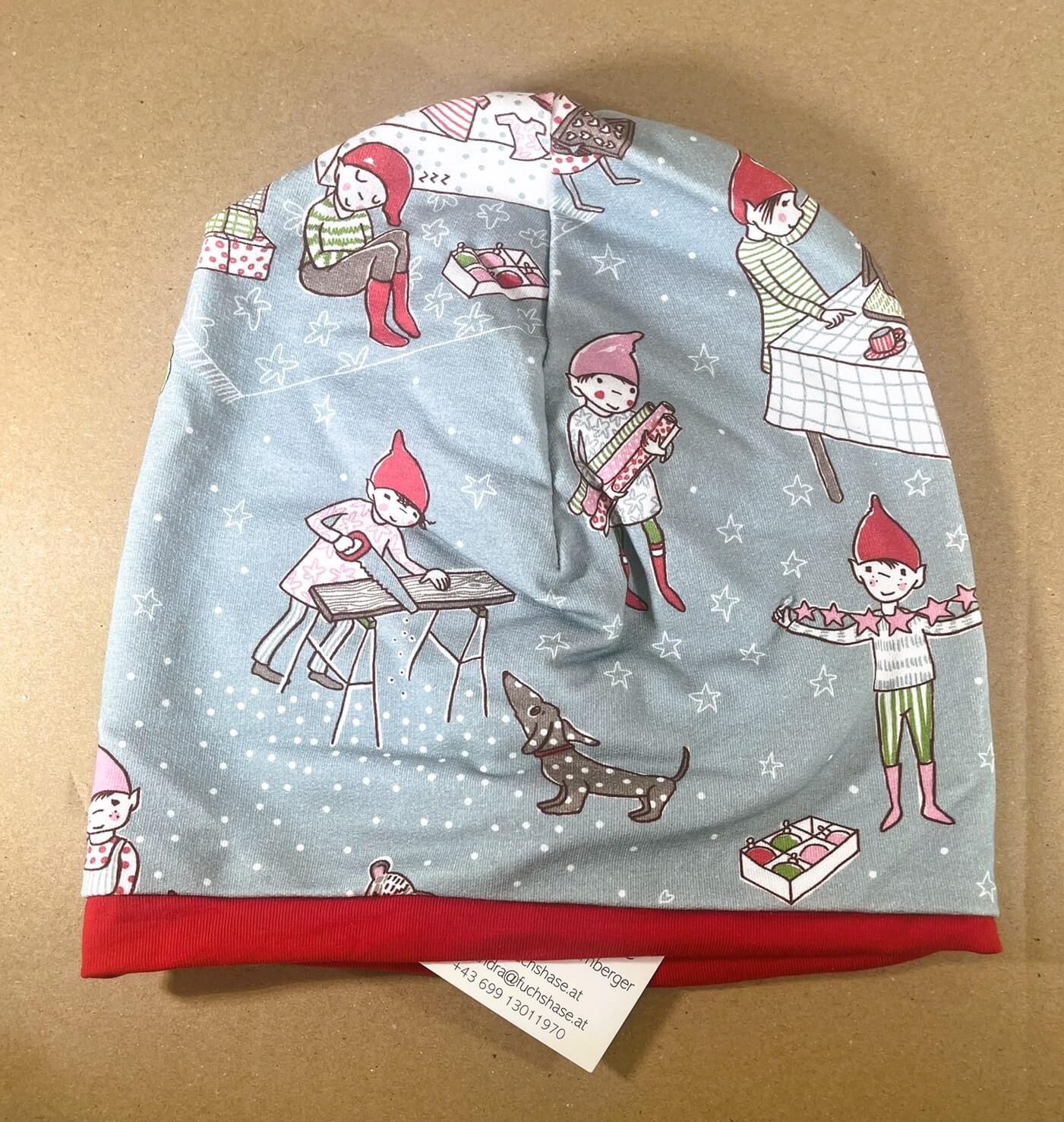 Wendehaube hellblau mit Wichteln