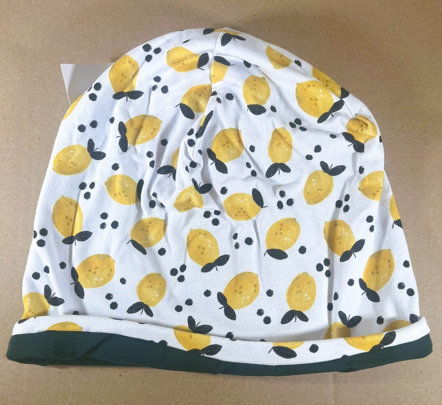 Wendehaube beige weiß mit Zitronen