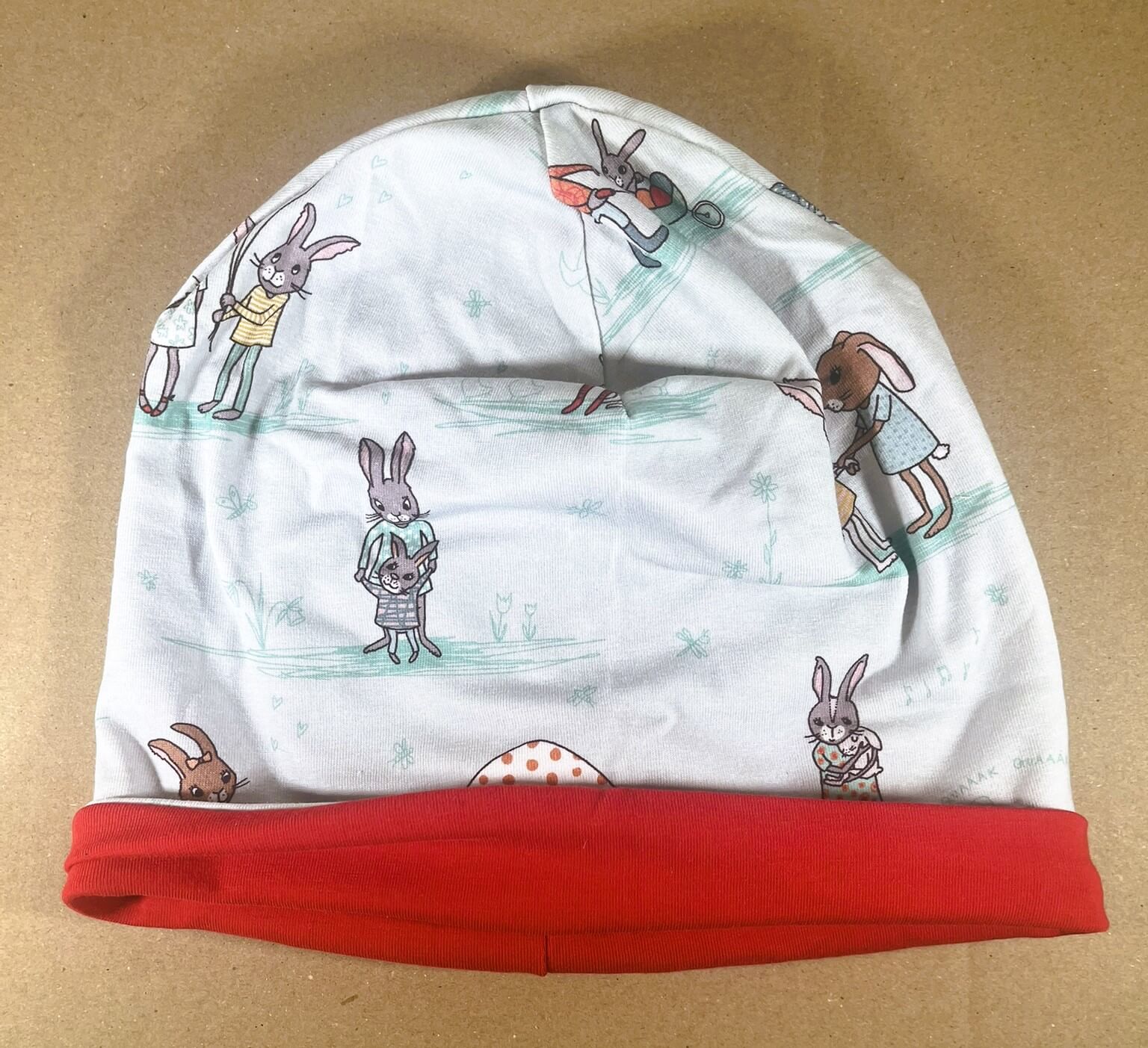 Wendehaube hellblau mit Hasen