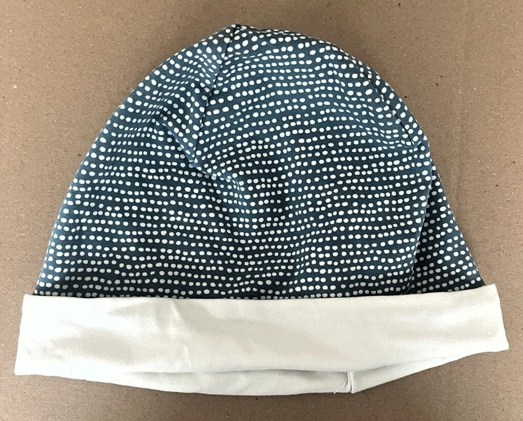 Wendehaube hellblau mit kleine Punkten