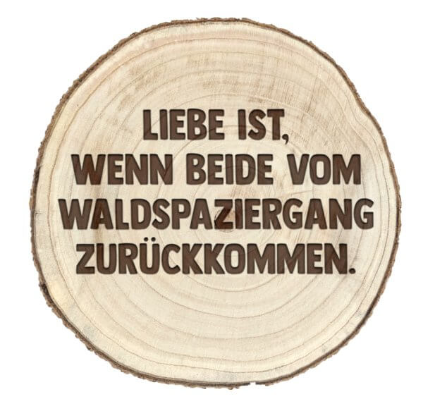 Dein TEXT gelasert in eine Baumscheibe.