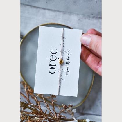 Beiges Armband mit Herz in Gold