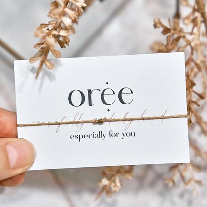 Braunes Armband mit kleiner Makrameeperle