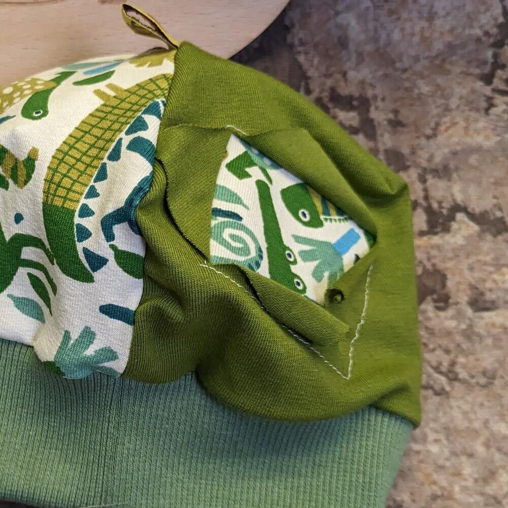 Bündchenhaube grüne Tiere, Gr. S - Image 2