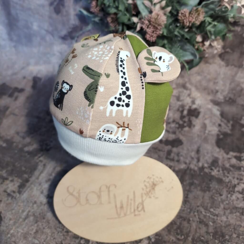 Bündchenhaube African Animals, Gr. S 39-45cm