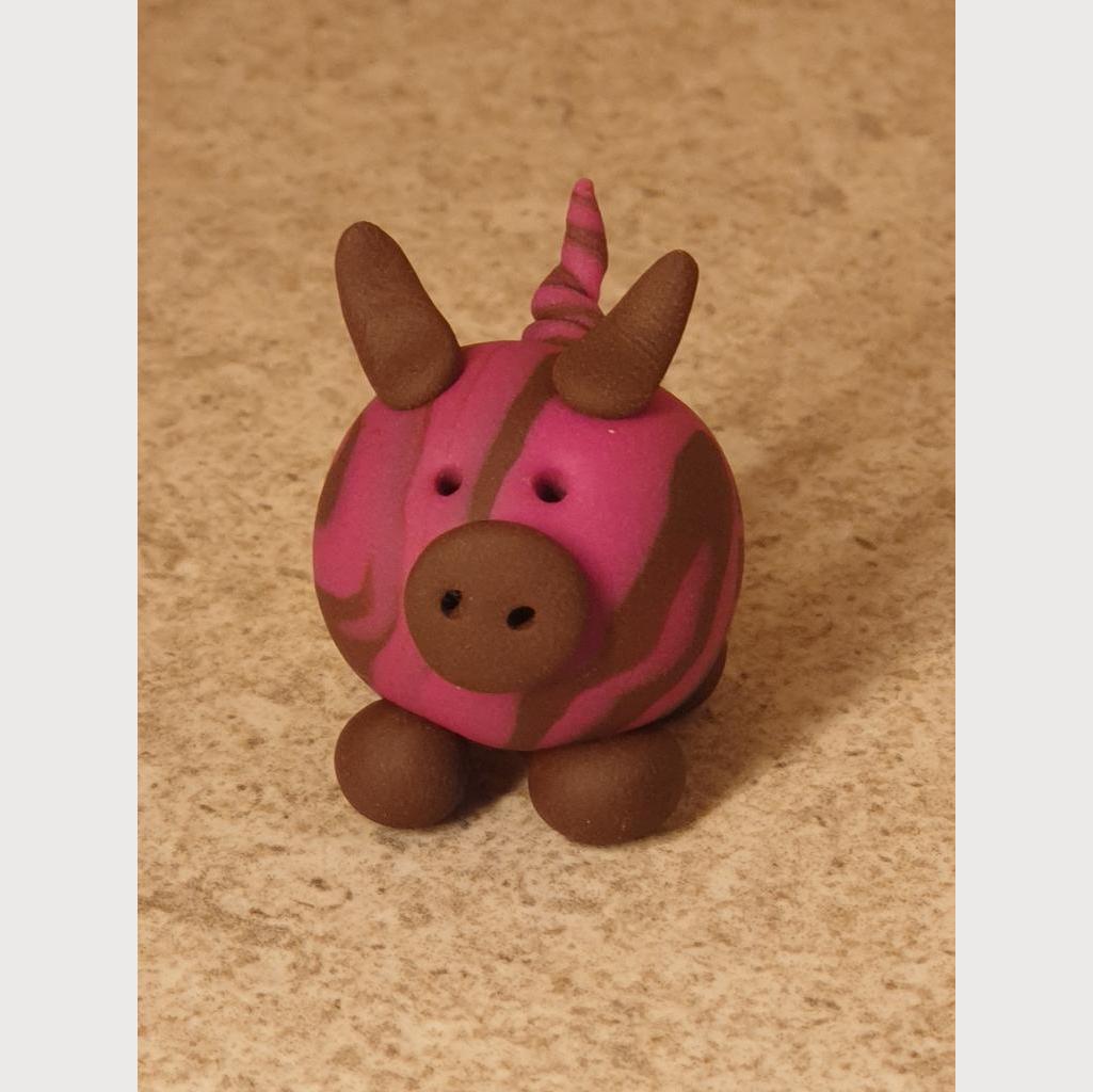 Glücksschweinchen aus Fimo braun/rosa
