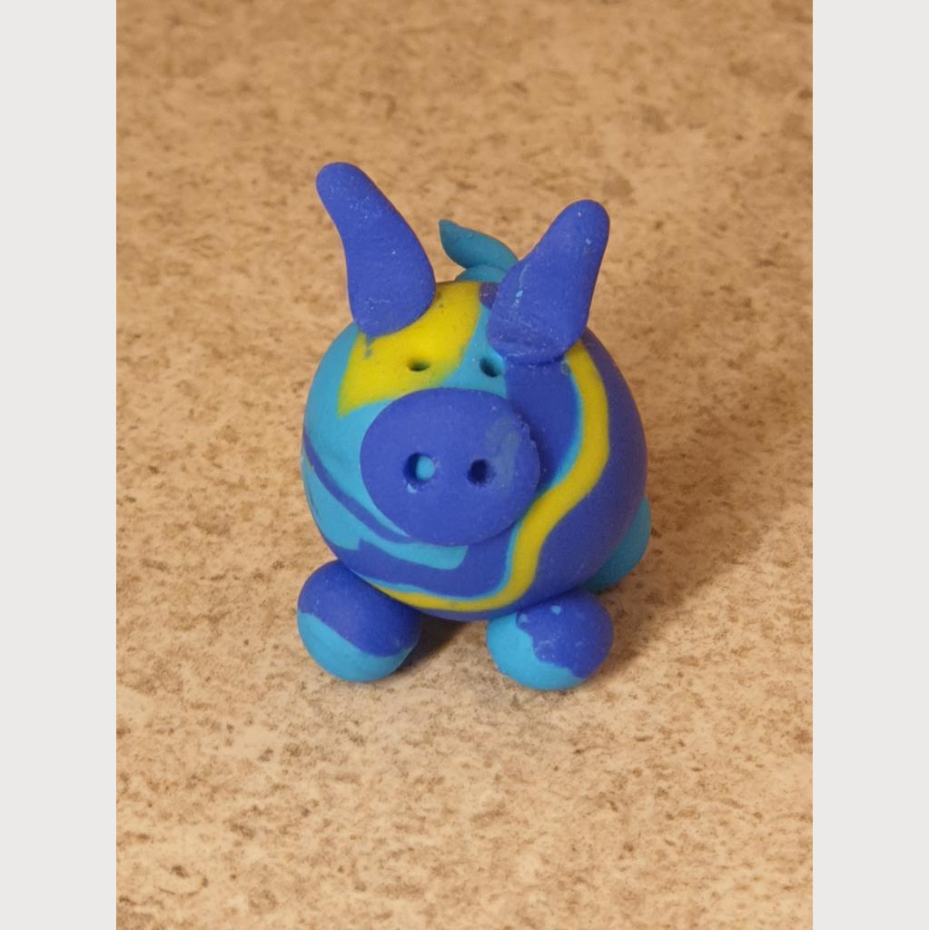 Glücksschweinchen aus Fimo dreifärbig