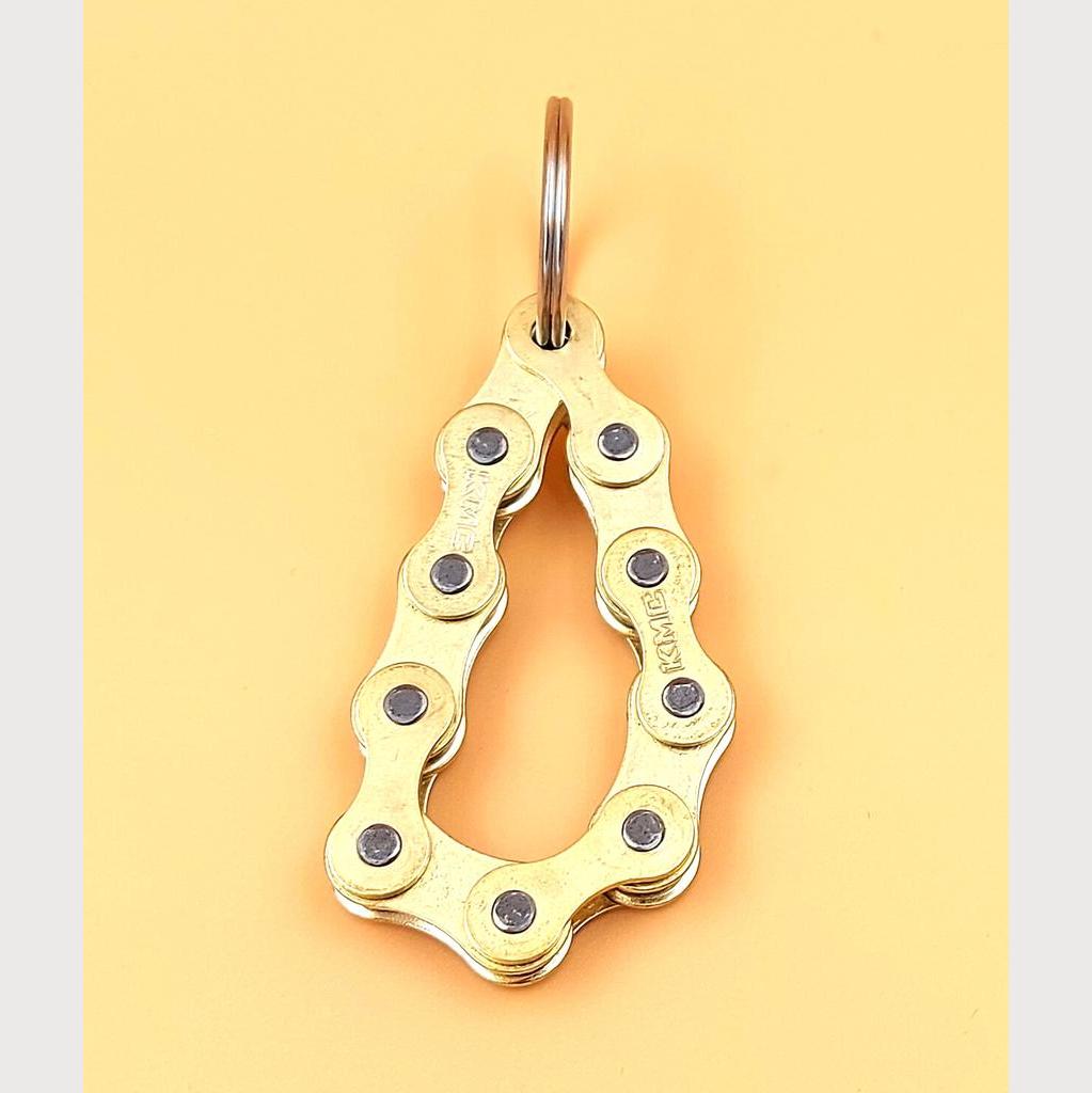 Schlüsselanhänger aus Fahrradketten, gold