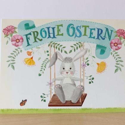 Osterkarte Osterhase auf der Schaukel